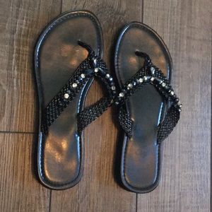 Black flip flops with jewel decoration